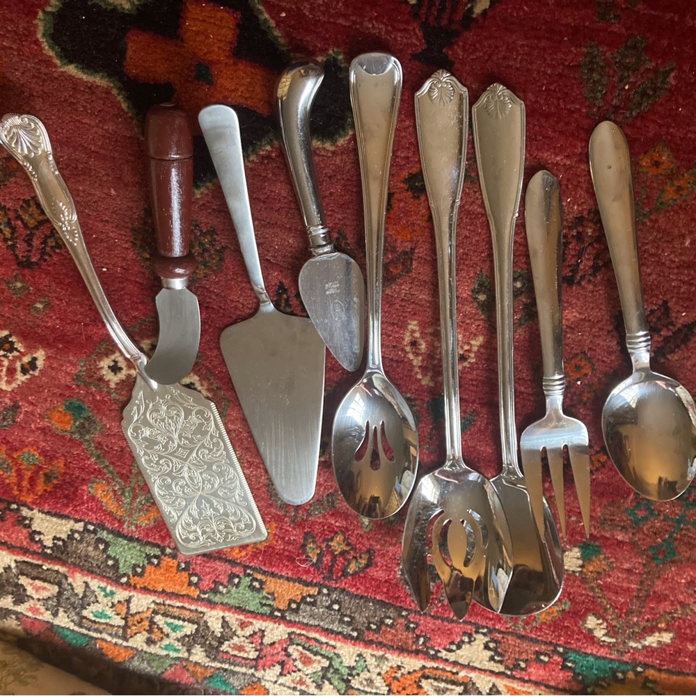 9 piece quality stainless steel server utensil set from various makers.